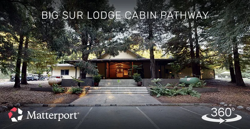 Matterport 3D virtual tour of a forest pathway leading to lodge cabins, created by ShutterSpin. Guests can preview the natural setting and rustic accommodations before booking their stay.